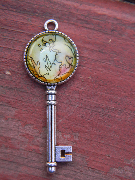 Pendentif oeuvre à porter clé