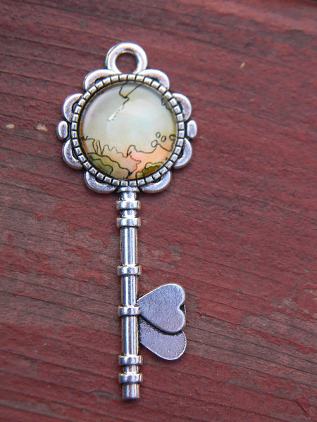 Pendentif oeuvre à porter clé