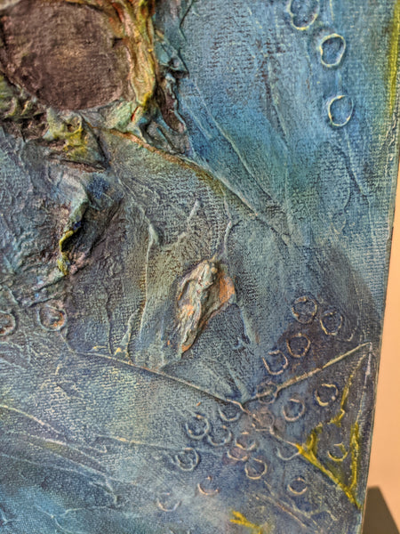 Le petit ange apparu dans la texture, environ au centre de cette image.